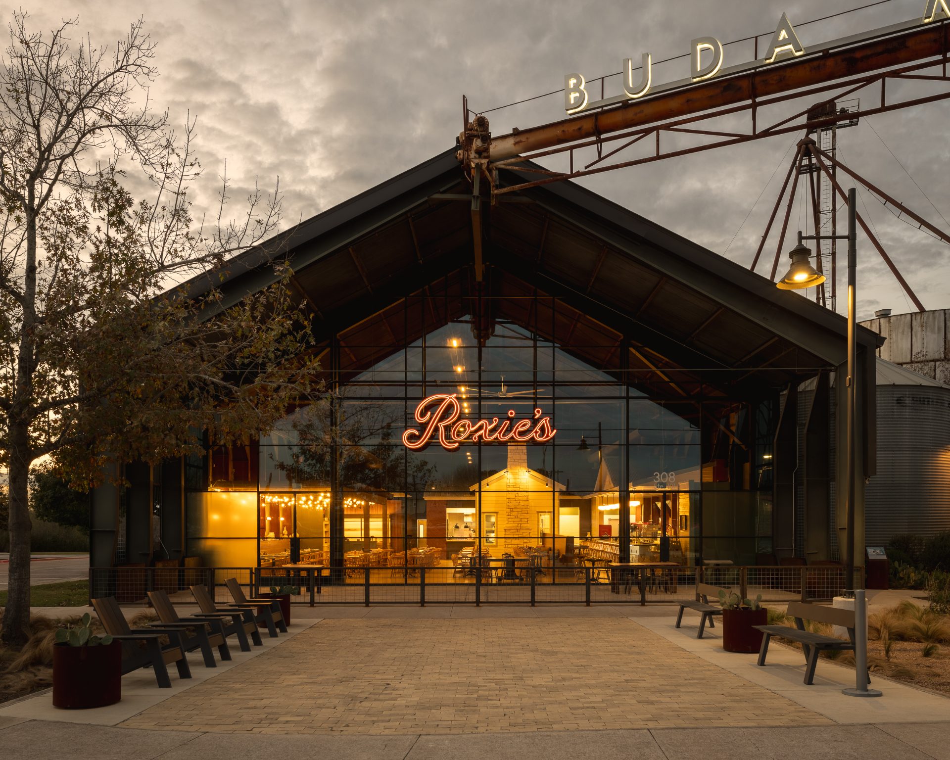 Roxie's at Buda Mill & Grain at twilight, a Woolsey historic renovation